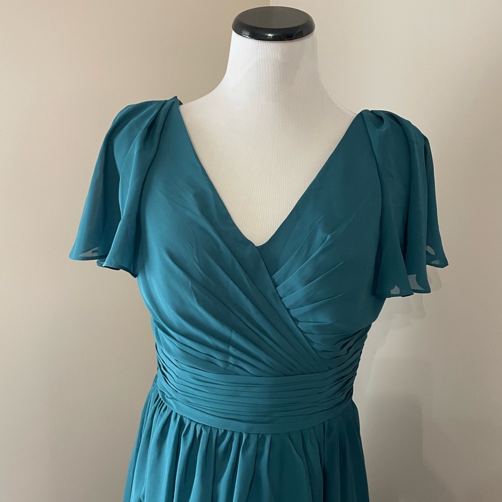 Full length peacock blue color dress. Corset tie back, fully lined